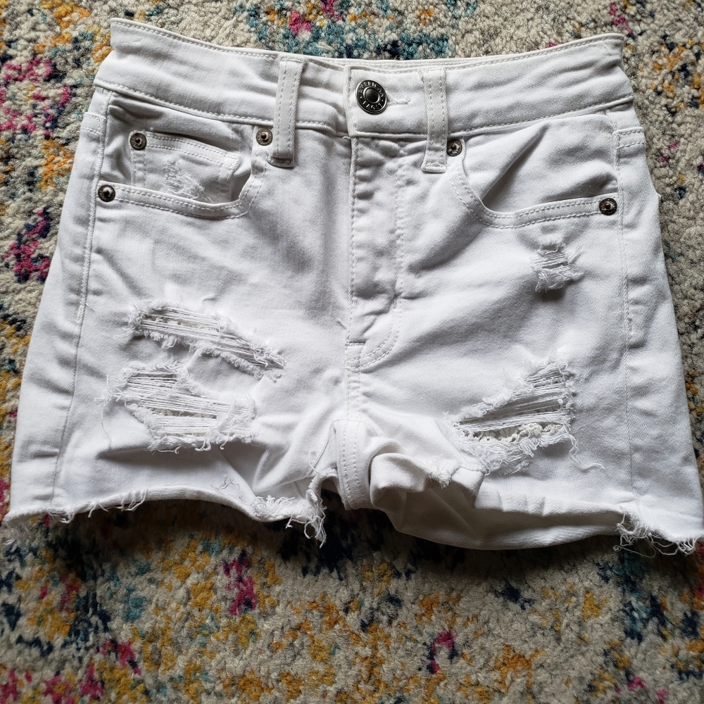 American Eagle High Rise White Distressed Denim Shorts Lace Under Rips